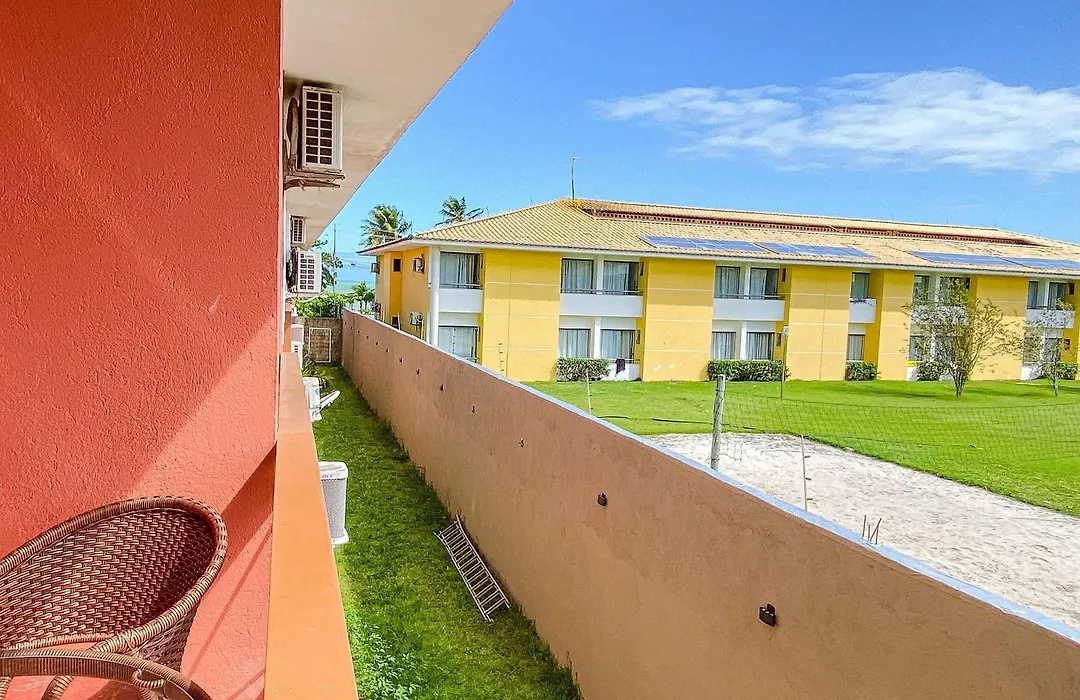 Flat frente praia de Taperapuã, atravessou a rua está na praia, com piscina, sauna e café da manhã como cortesia-1